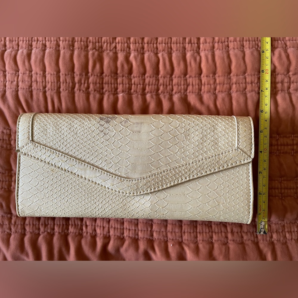 White fake snakeskin clutch